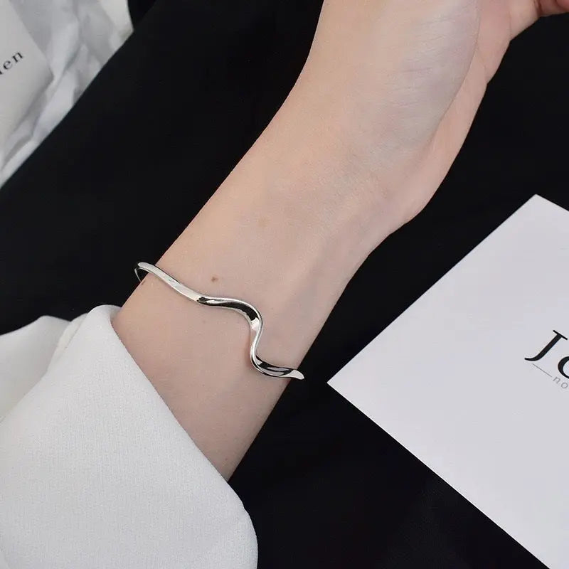 WAVE SILVER BANGLE Mira Gemini