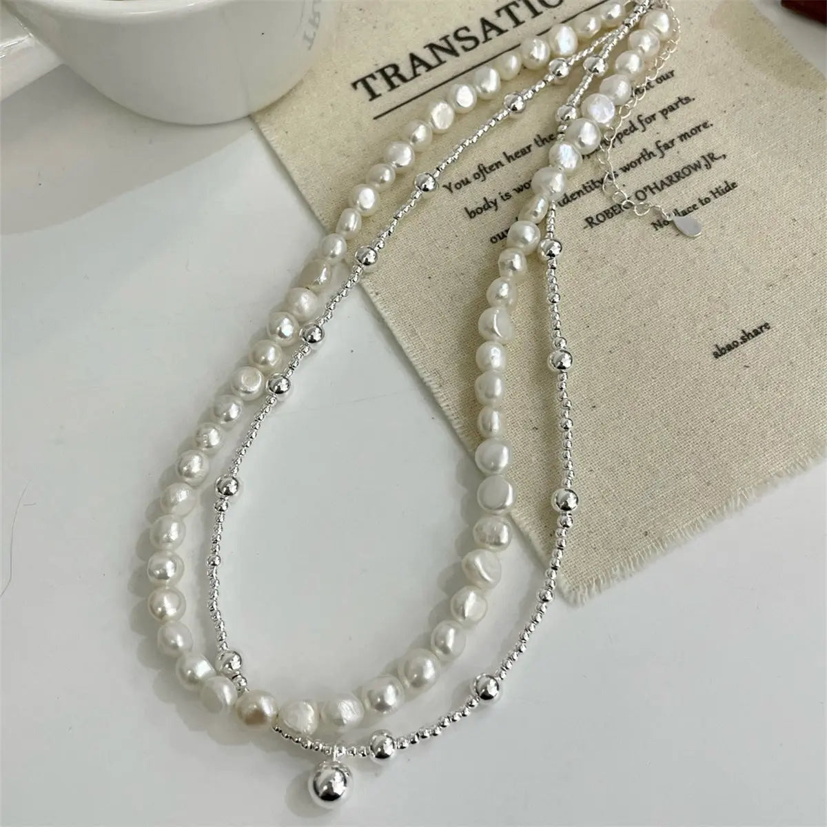 LAYERED PEARL SILVER NECKLACE Mira Gemini