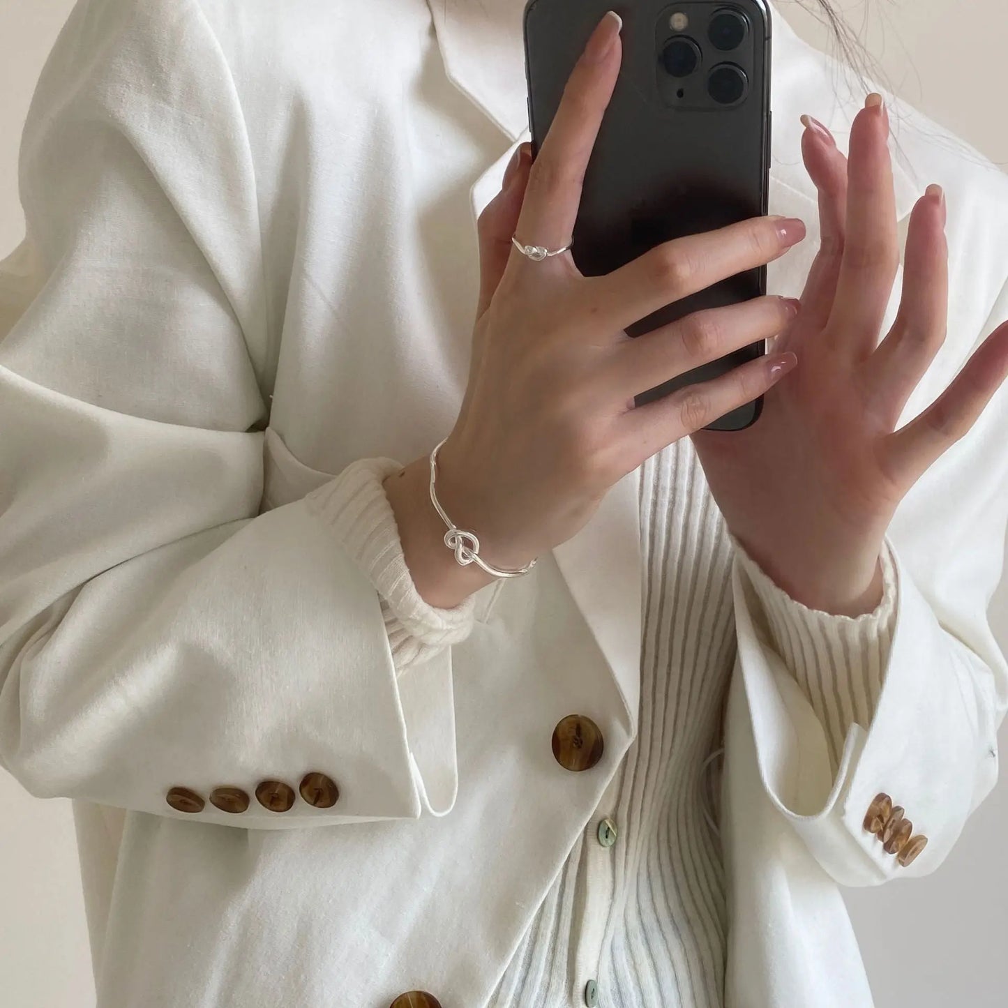 KNOT SILVER BANGLE Mira Gemini