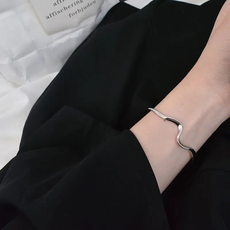 WAVE SILVER BANGLE Mira Gemini